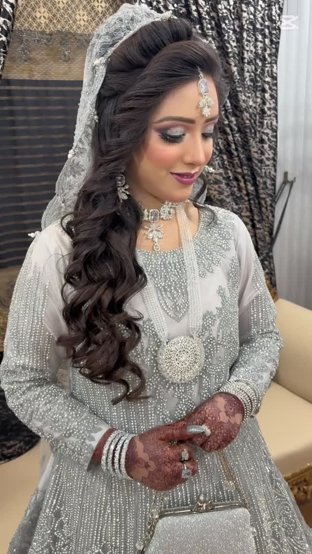 Silver occasion look with voluminous curls
